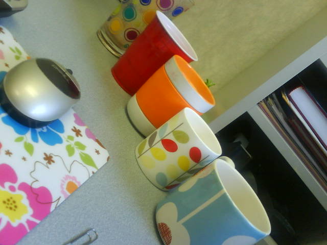 Cute cups on desk
