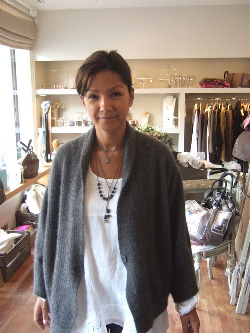 Must find gray cardi to wear over white tunic