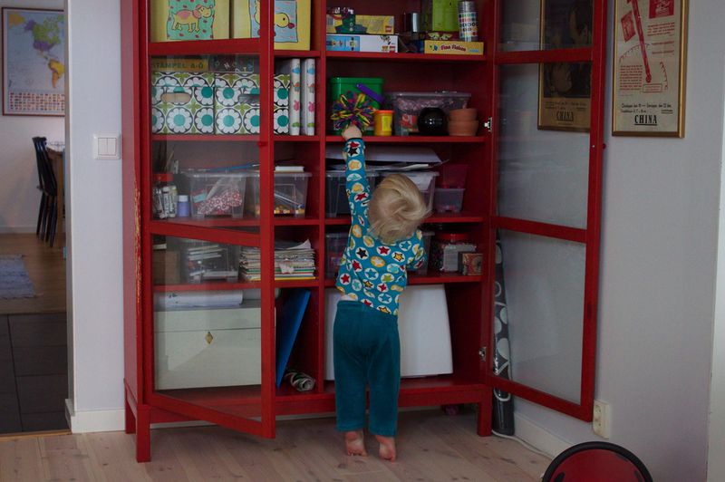 Red family cabinet - via green is the new black