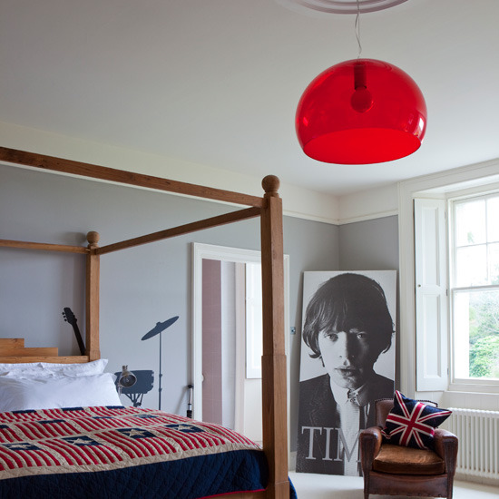 Wrap wallpaper around plywood and lean it against walls