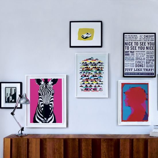 Wrap wallpaper around plywood and lean it against walls